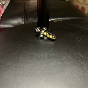 3/$8 Gold Sword Croc Charm